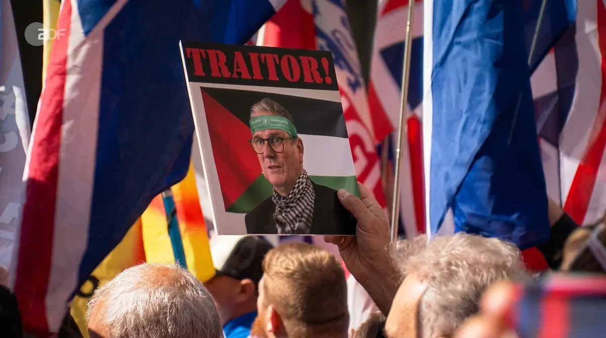 Protesters with flags at Unite the Kingdom rally central London