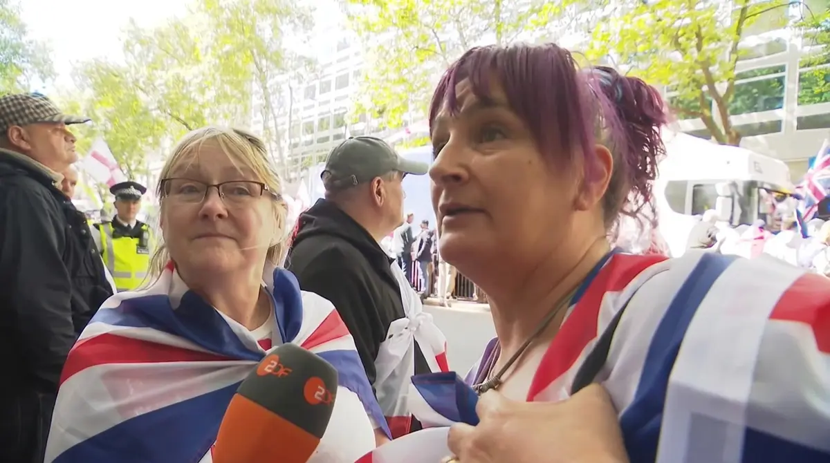Rally supporter with Union Jack flag London